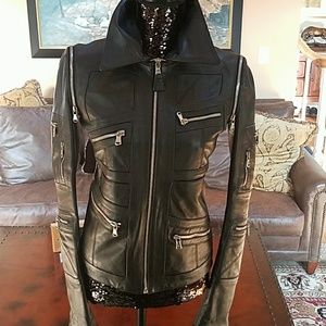 Dolce & Gabbana  jacket that can turn into a vest.